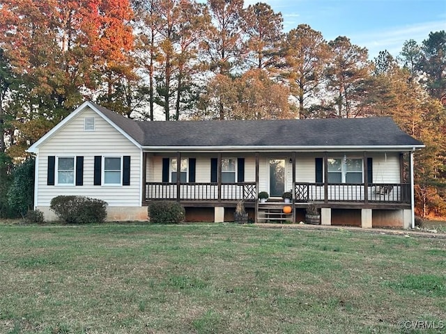 single story home with a porch and a front yard