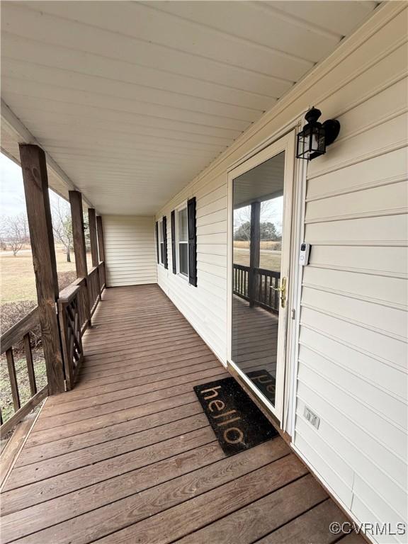 wooden terrace with covered porch