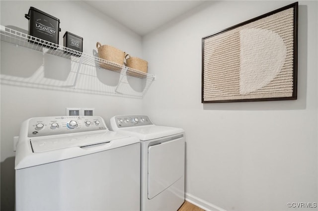 laundry room featuring washer and clothes dryer