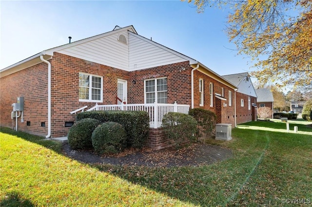 view of property exterior with a lawn