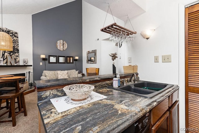 bar with sink, light carpet, and vaulted ceiling