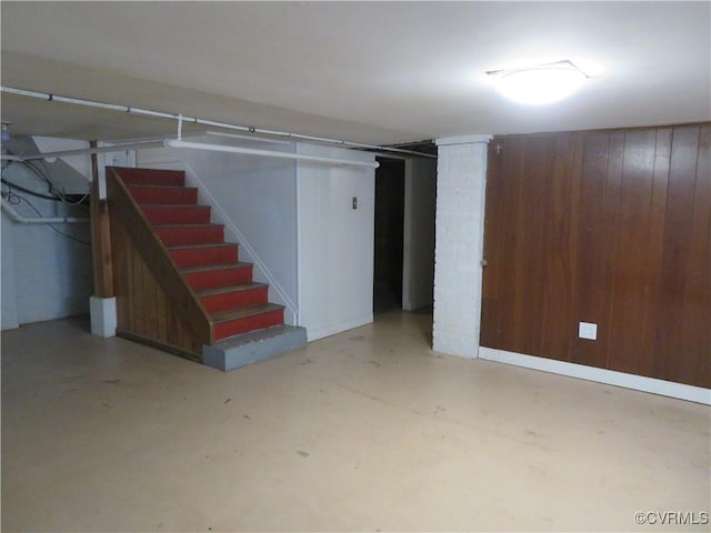 basement with wood walls