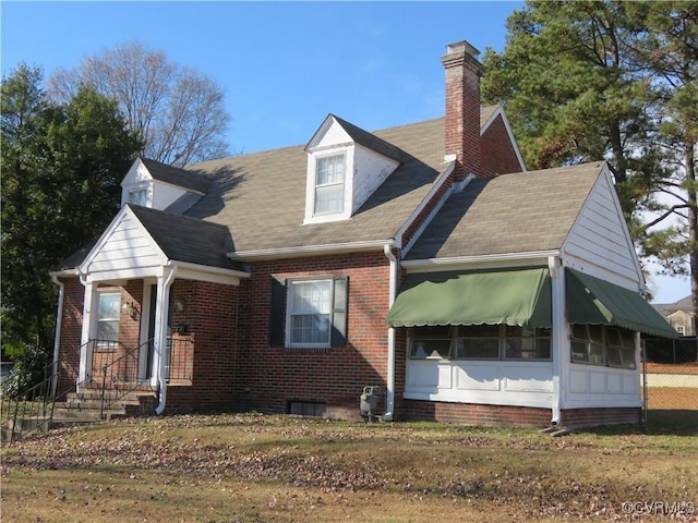 view of new england style home