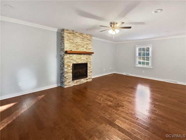 unfurnished living room with hardwood / wood-style floors, ceiling fan, ornamental molding, and a fireplace