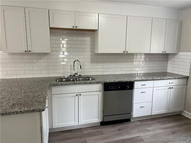 kitchen featuring dishwasher, white cabinets, dark hardwood / wood-style floors, and sink