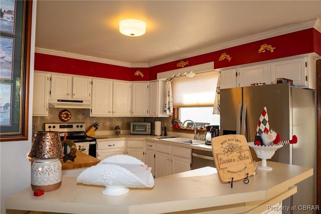 kitchen with stainless steel appliances, white cabinetry, and plenty of natural light