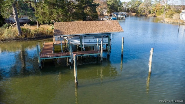 view of dock with a water view