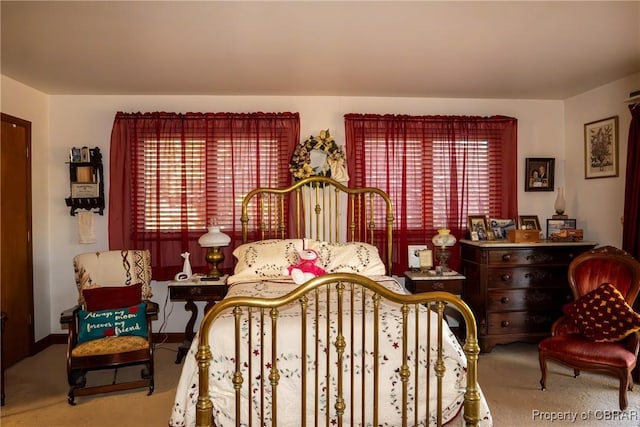 bedroom featuring carpet