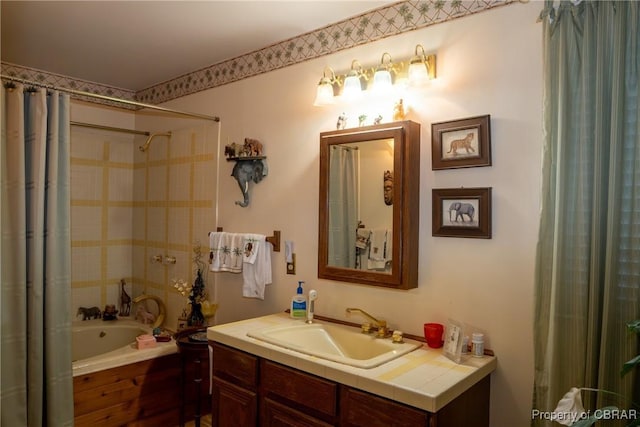 bathroom featuring shower / bath combo and vanity