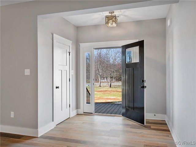 foyer entrance featuring light wood-type flooring