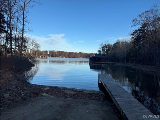 dock area featuring a water view