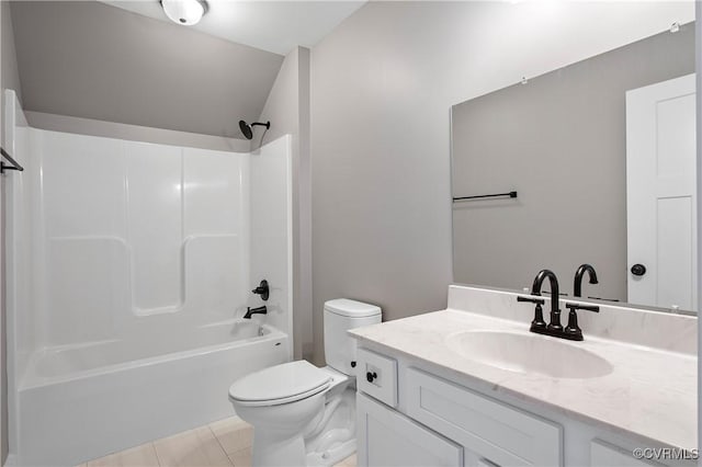 full bathroom featuring tub / shower combination, tile patterned floors, vanity, and toilet