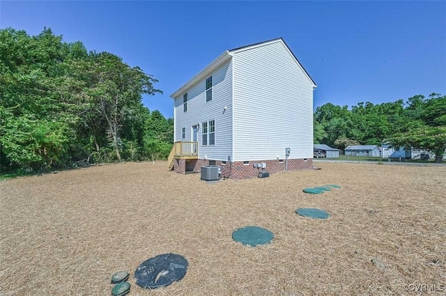 view of property exterior featuring central AC