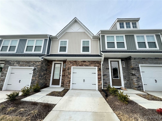 townhome / multi-family property featuring a garage