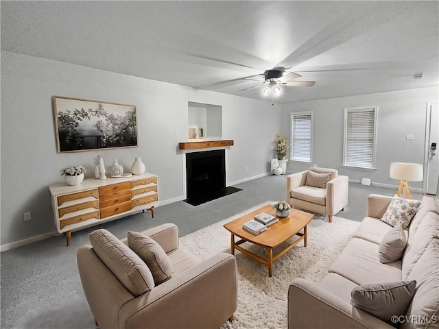 living room featuring ceiling fan and light carpet