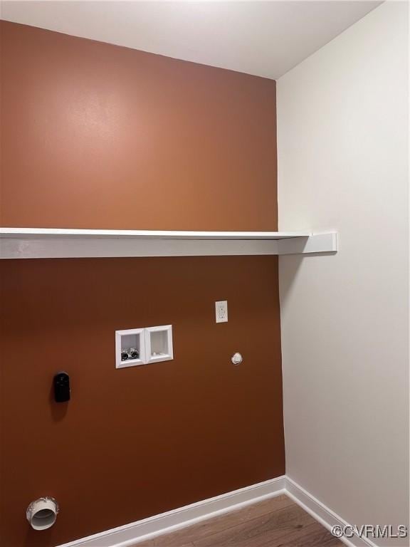 washroom featuring hardwood / wood-style floors and hookup for a washing machine