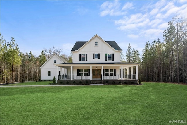 farmhouse-style home with covered porch and a front yard