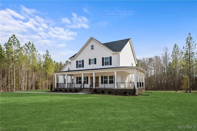 view of front of house with a front lawn and covered porch