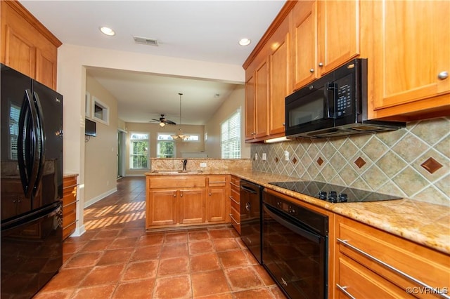 kitchen with backsplash, black appliances, vaulted ceiling, ceiling fan, and kitchen peninsula