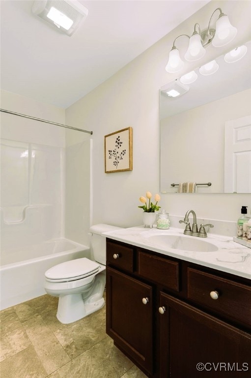 full bathroom with shower / tub combination, vanity, and toilet