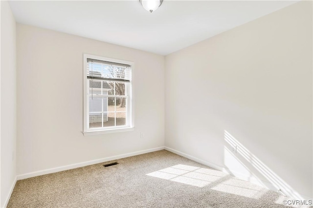 view of carpeted spare room