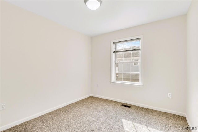 view of carpeted spare room