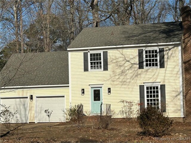 view of front of house with a garage