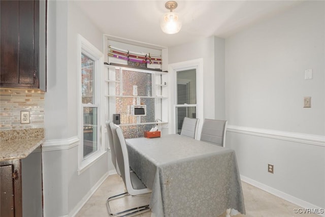 dining area with plenty of natural light