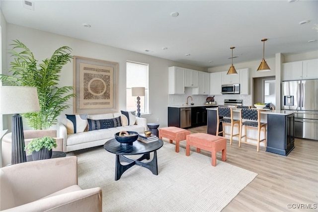 living room featuring light hardwood / wood-style flooring