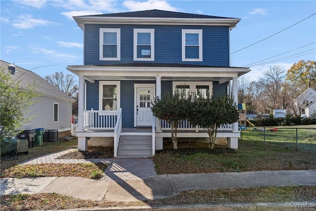 view of front property featuring a porch and central air condition unit