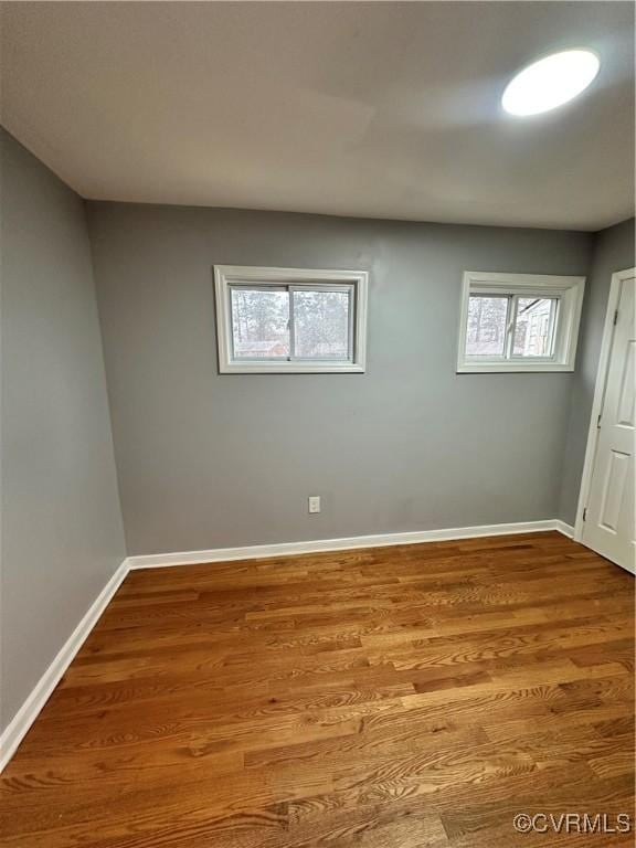 unfurnished room with light hardwood / wood-style flooring