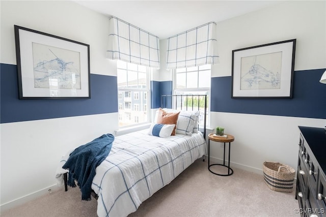 bedroom with light colored carpet