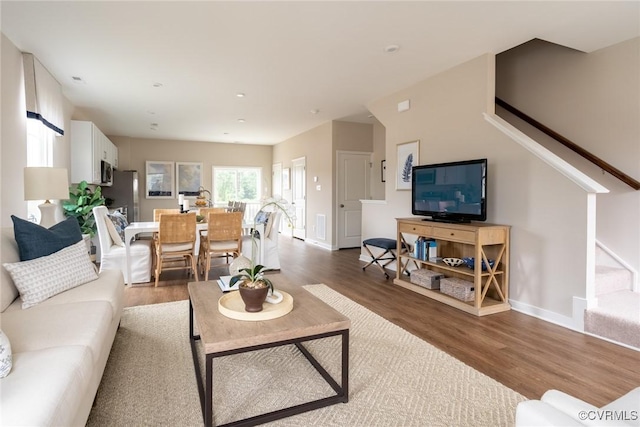 living room featuring wood-type flooring