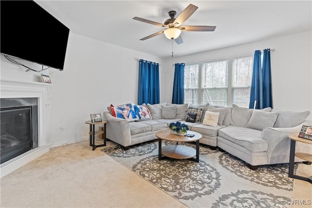 living room featuring ceiling fan and light carpet