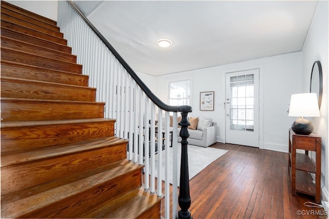 foyer featuring dark wood-type flooring