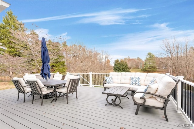 wooden deck with an outdoor hangout area