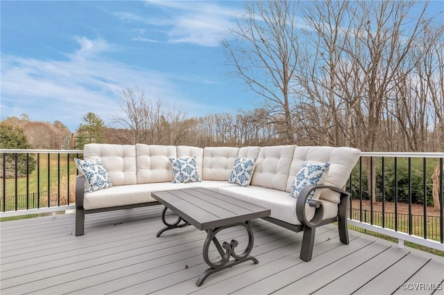 wooden terrace featuring outdoor lounge area