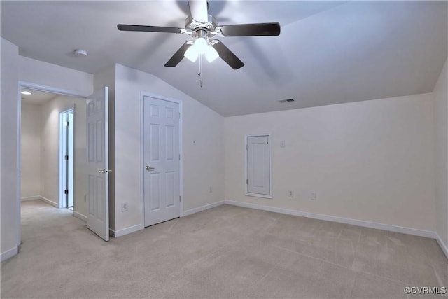 bonus room featuring ceiling fan, lofted ceiling, and light carpet