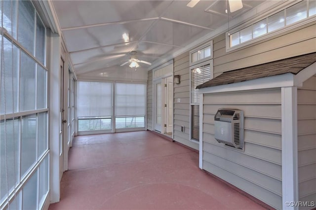 unfurnished sunroom featuring ceiling fan and lofted ceiling