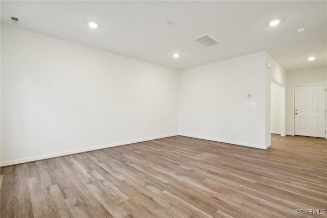 empty room with light wood-type flooring