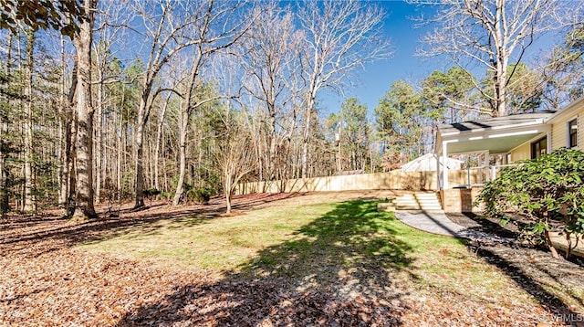 view of yard with fence