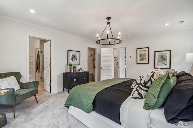 bedroom featuring a walk in closet, ornamental molding, light colored carpet, a chandelier, and a closet