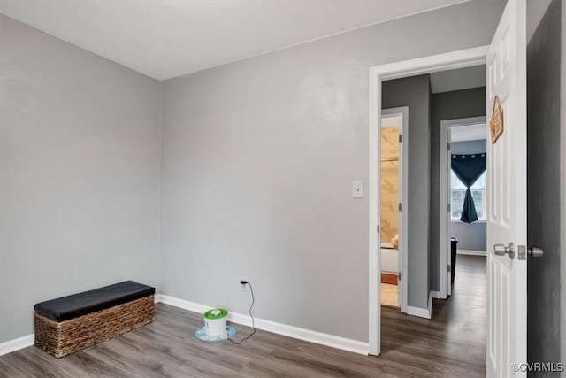 unfurnished room with dark hardwood / wood-style floors