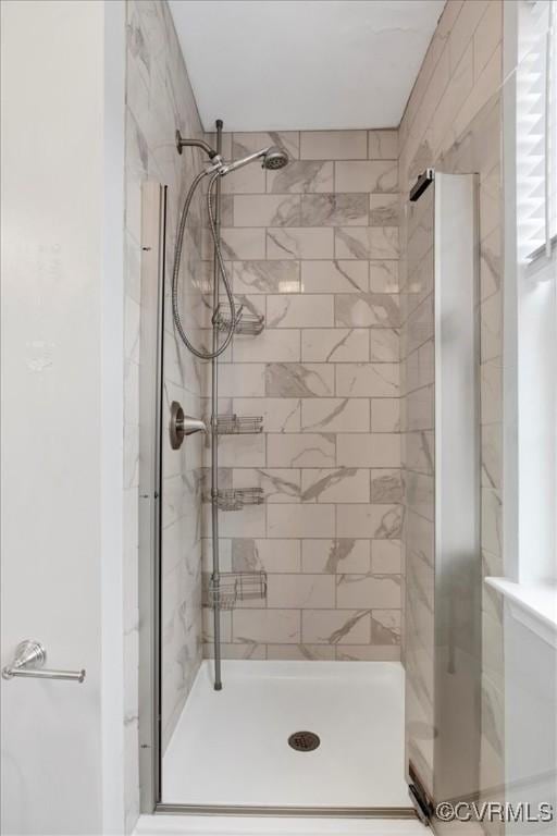 bathroom featuring walk in shower