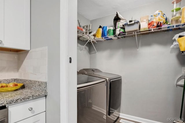 laundry area with washer and dryer