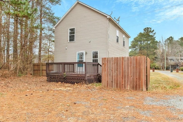 rear view of property with a deck