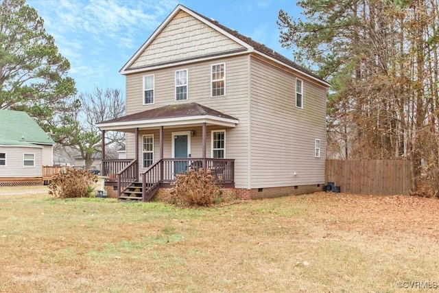 view of front facade with covered porch and a front lawn