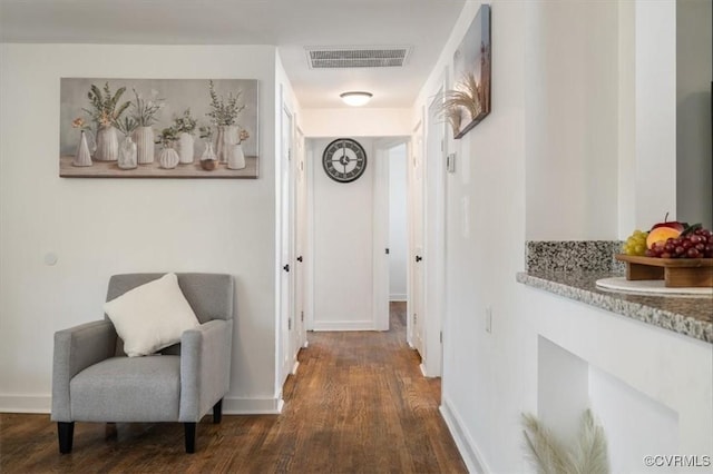 hall featuring dark wood-type flooring