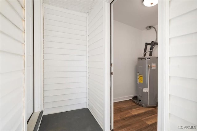 utility room with water heater