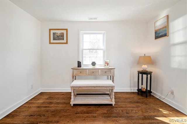 living area featuring dark hardwood / wood-style flooring